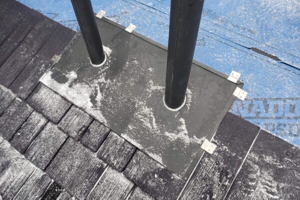 dual-pipe-flashing-installed-with-clips-and-water-check-folds